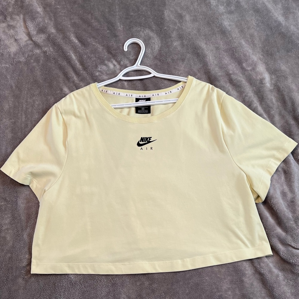 Neon green oversized Nike crop top